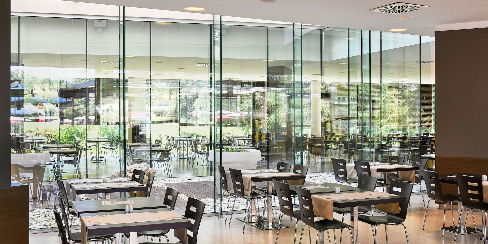 a room with tables and chairs