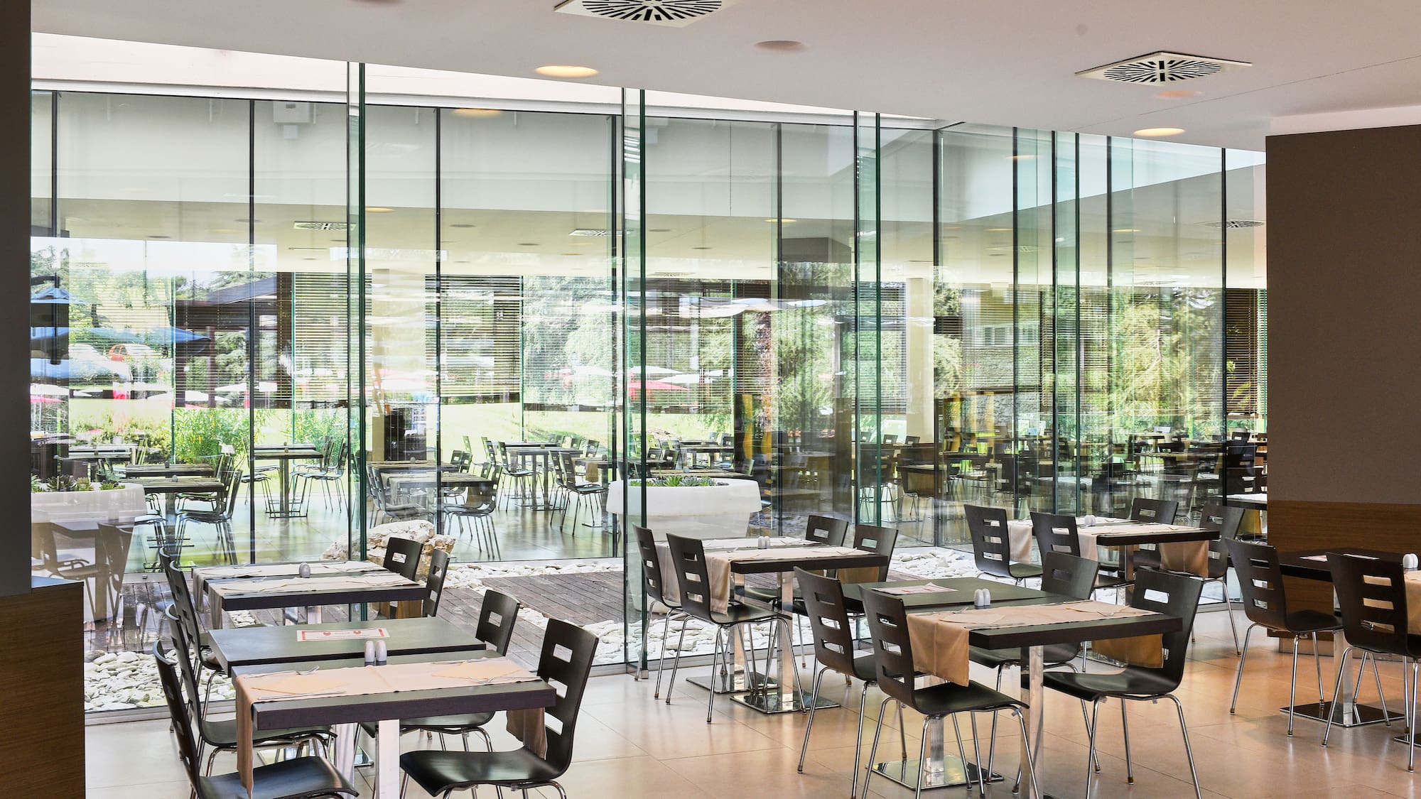 a room with tables and chairs