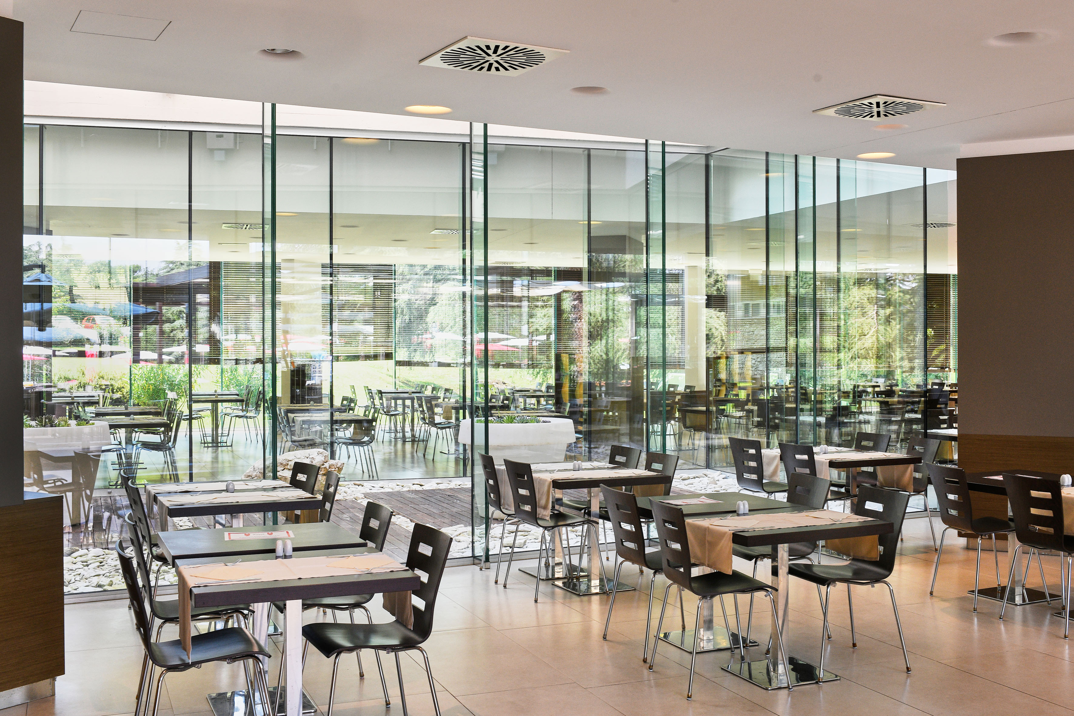 a room with tables and chairs
