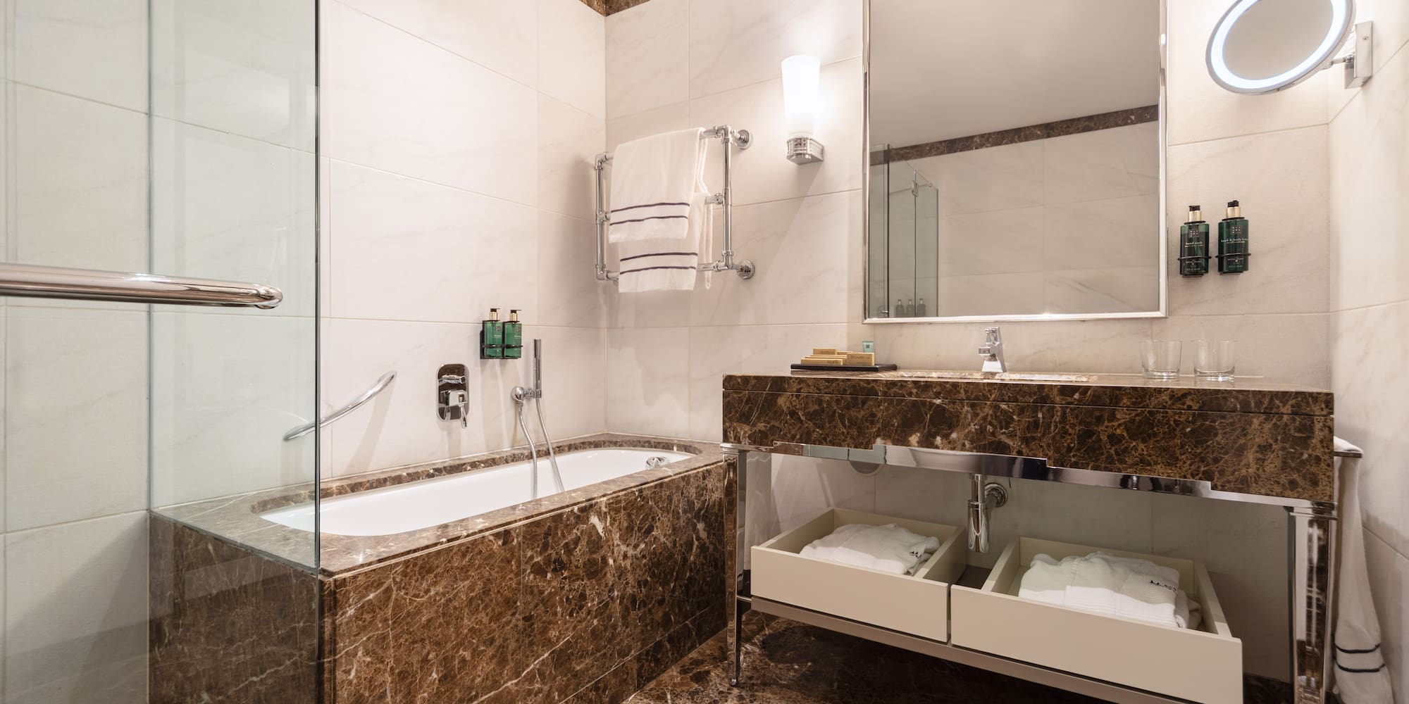 a bathroom with a bathtub and a mirror