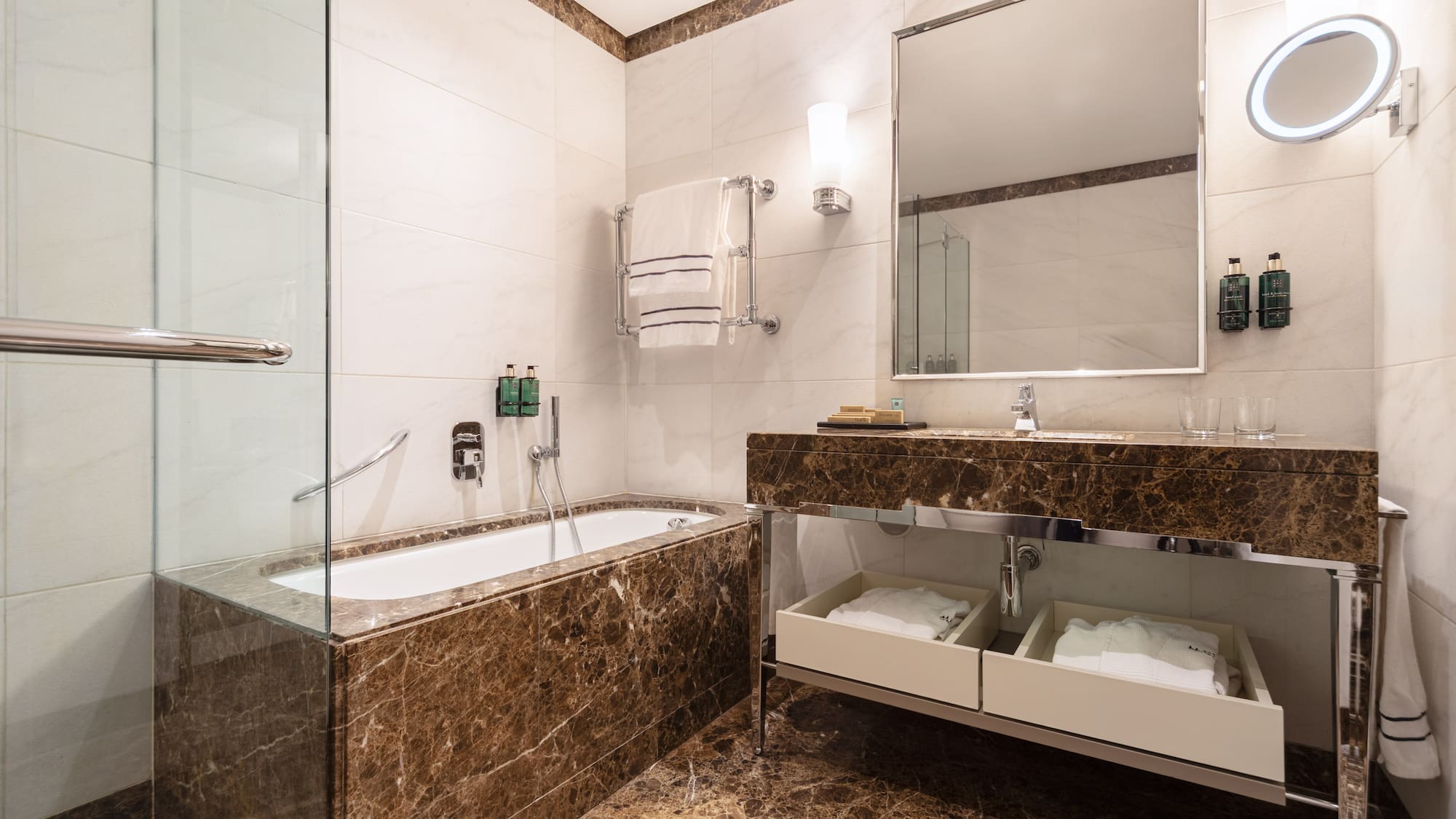 a bathroom with a bathtub and a mirror