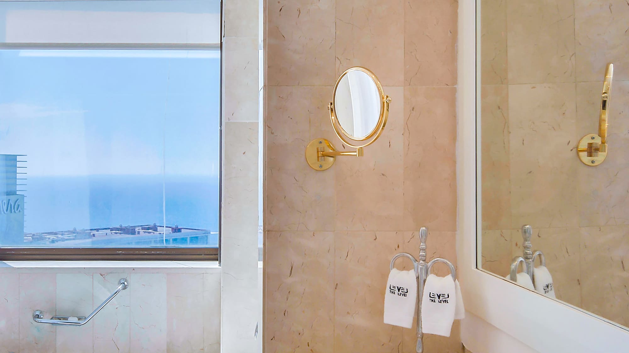 a bathroom with a tub and sink