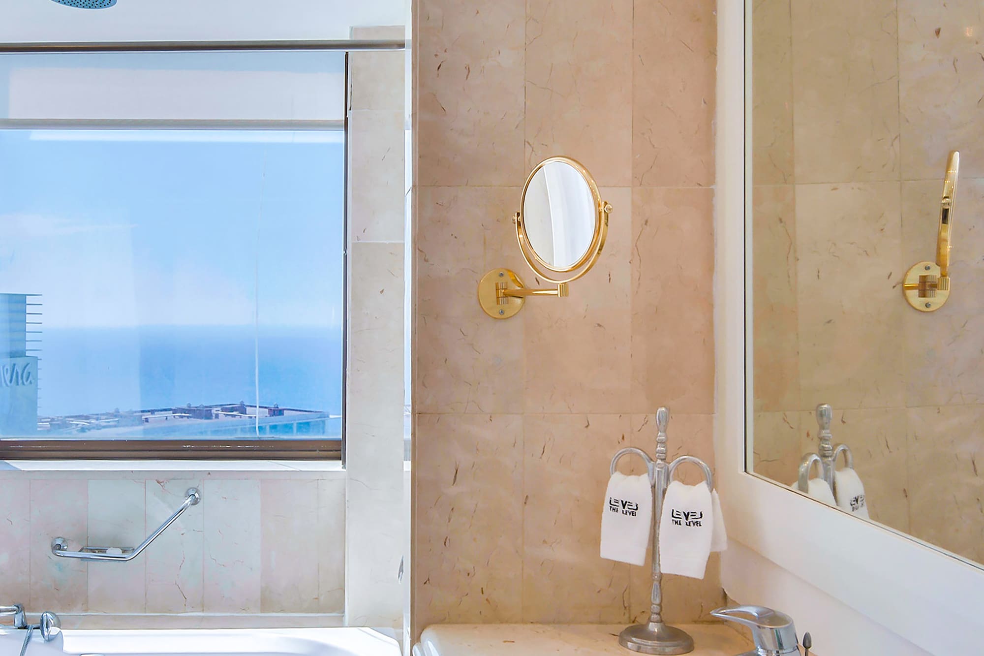 a bathroom with a tub and sink
