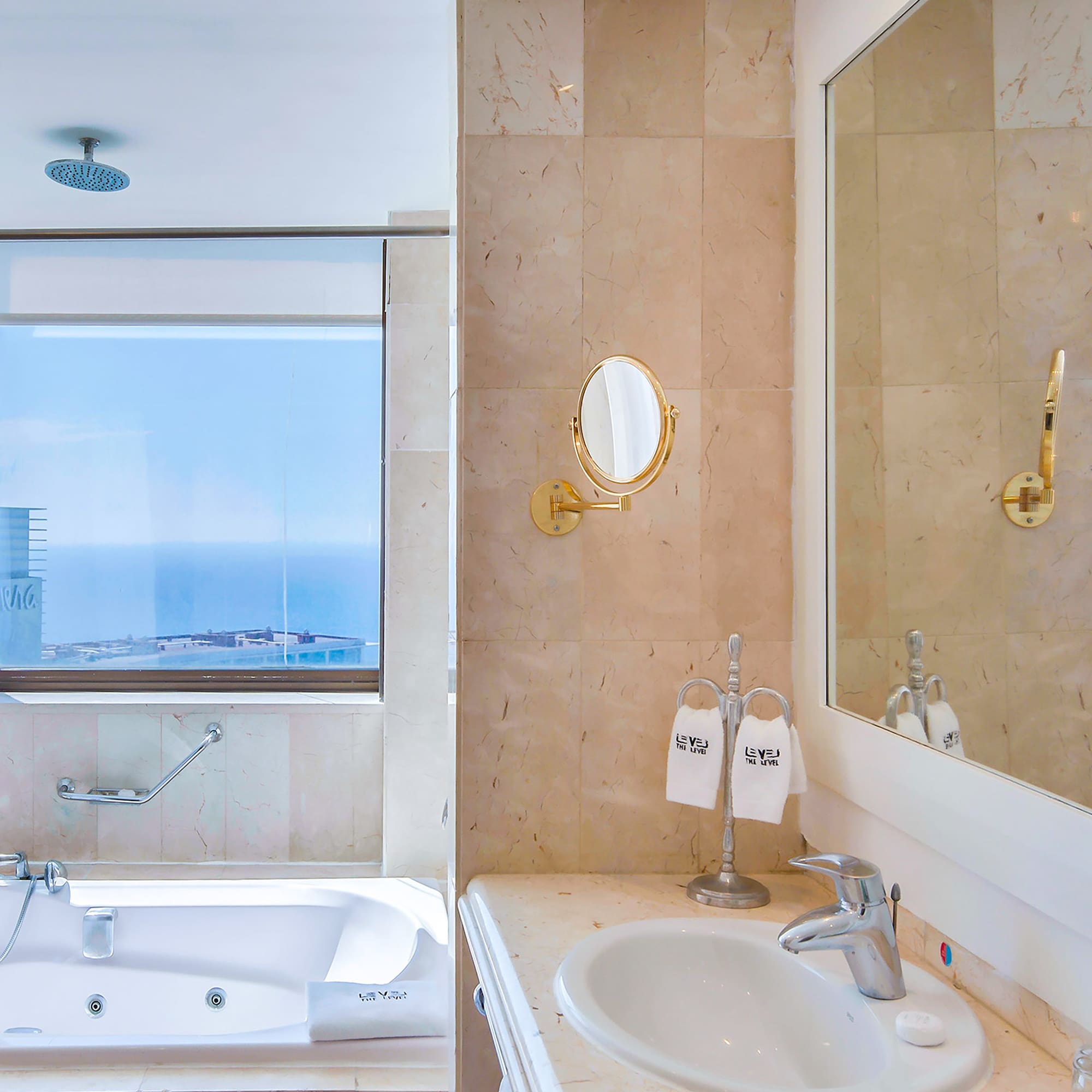 a bathroom with a tub and sink