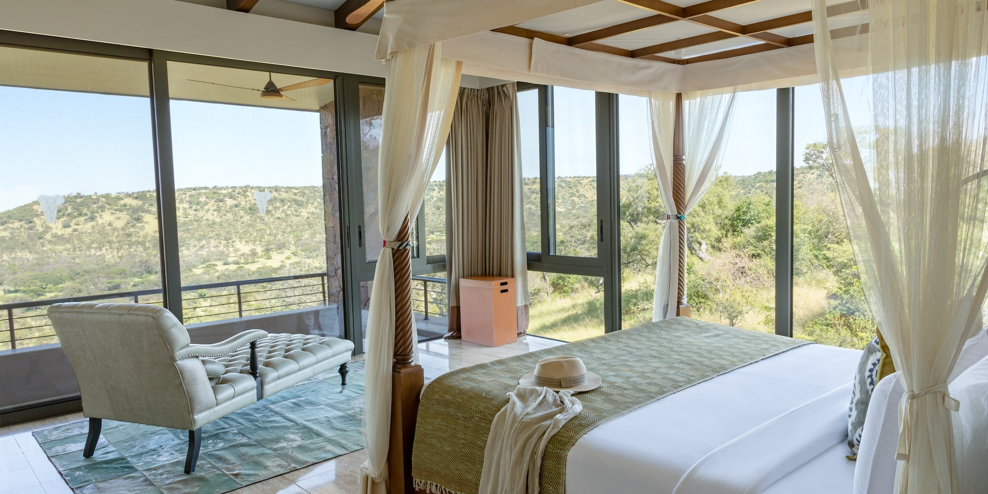 a room with a bed and a chair