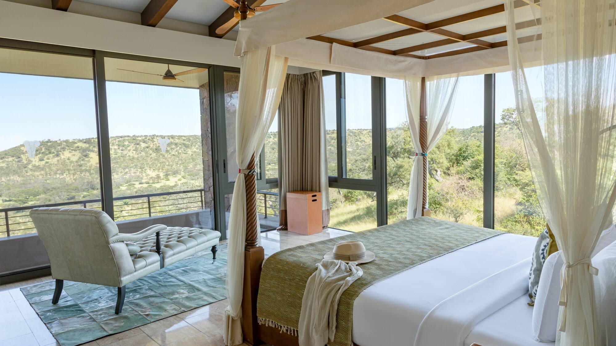 a room with a bed and a chair