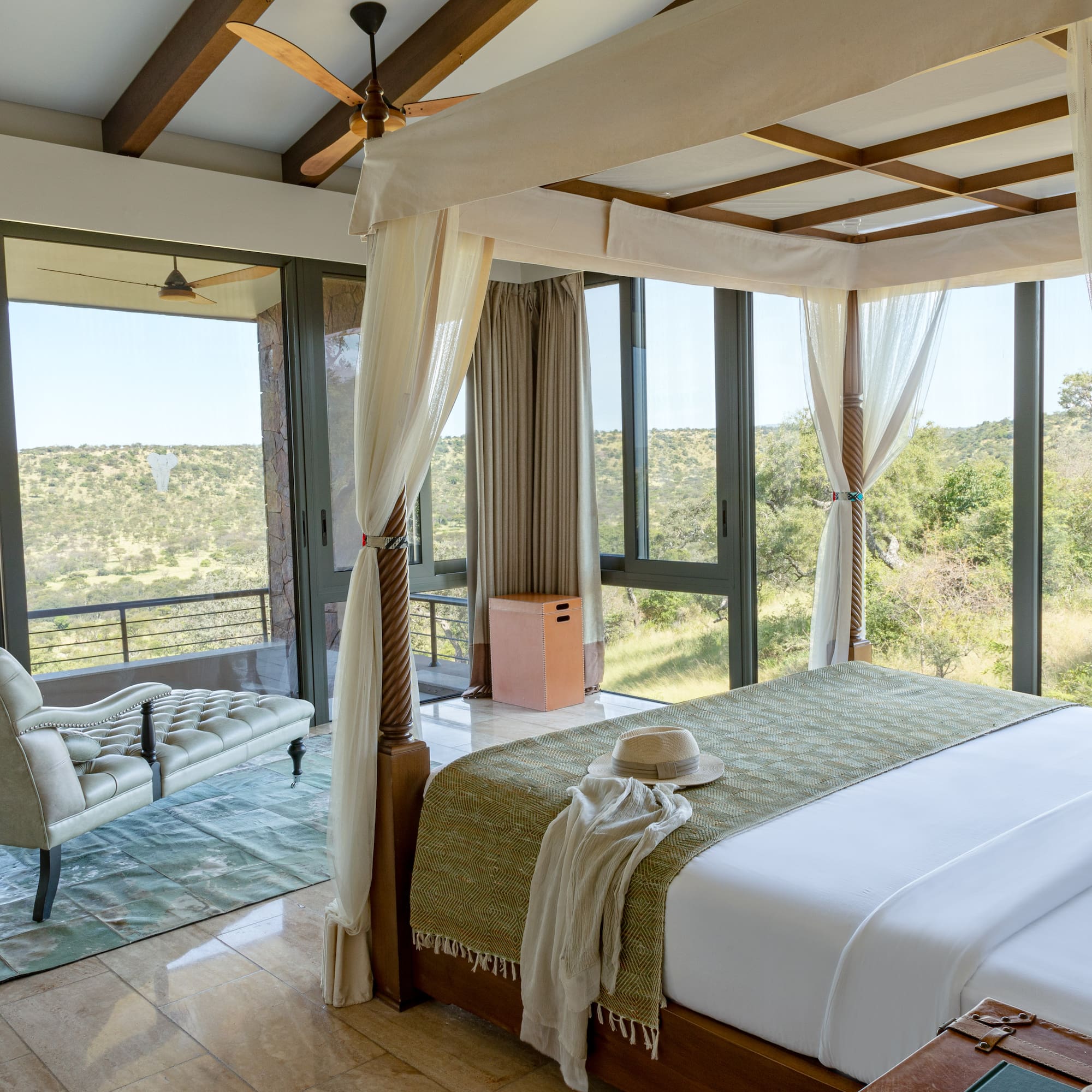 a room with a bed and a chair