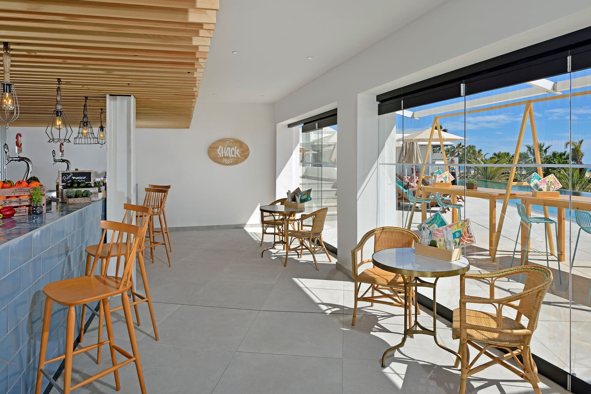 a room with tables and chairs