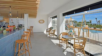 a room with tables and chairs