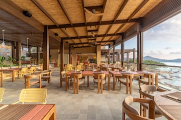 a restaurant with tables and chairs
