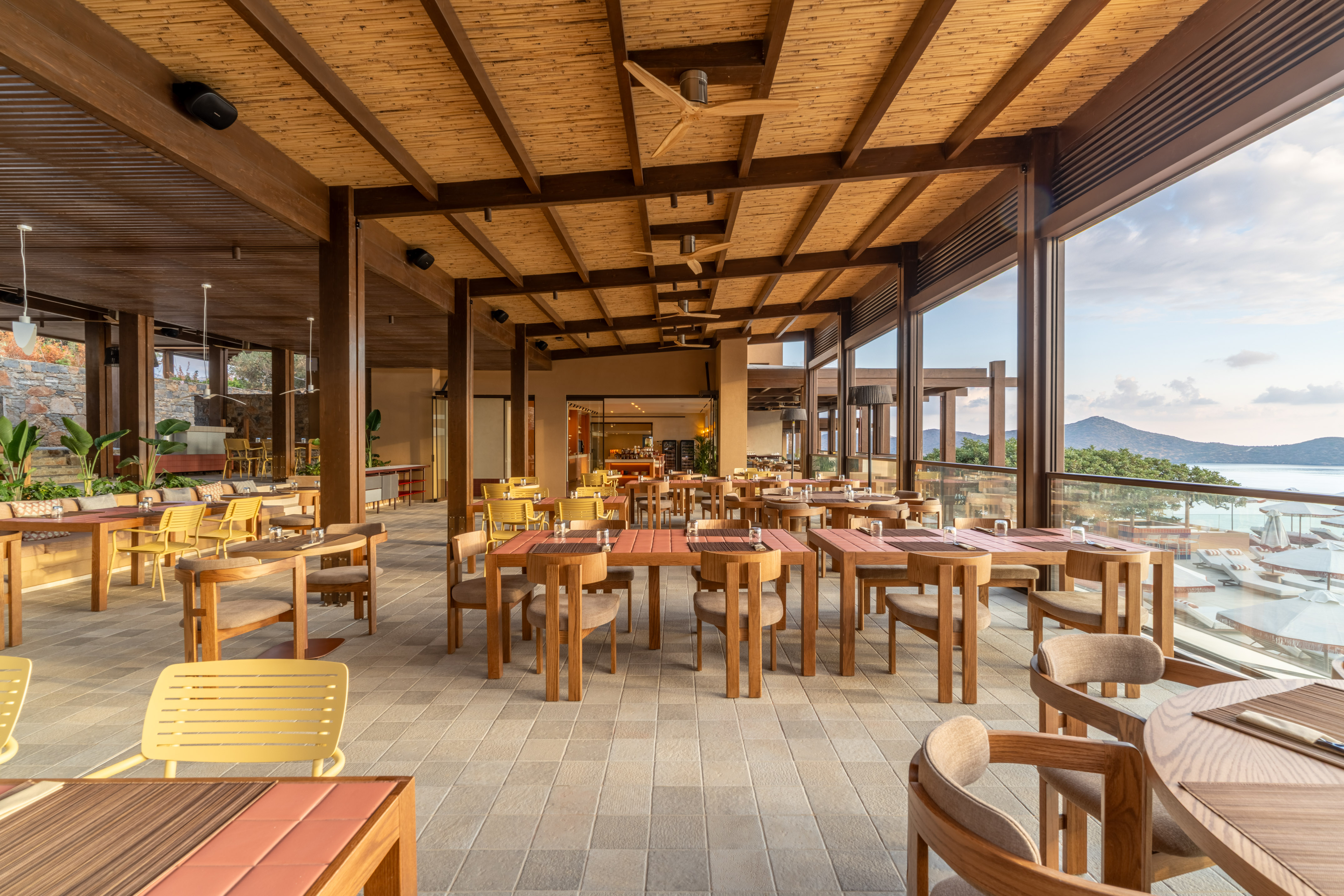 a restaurant with tables and chairs