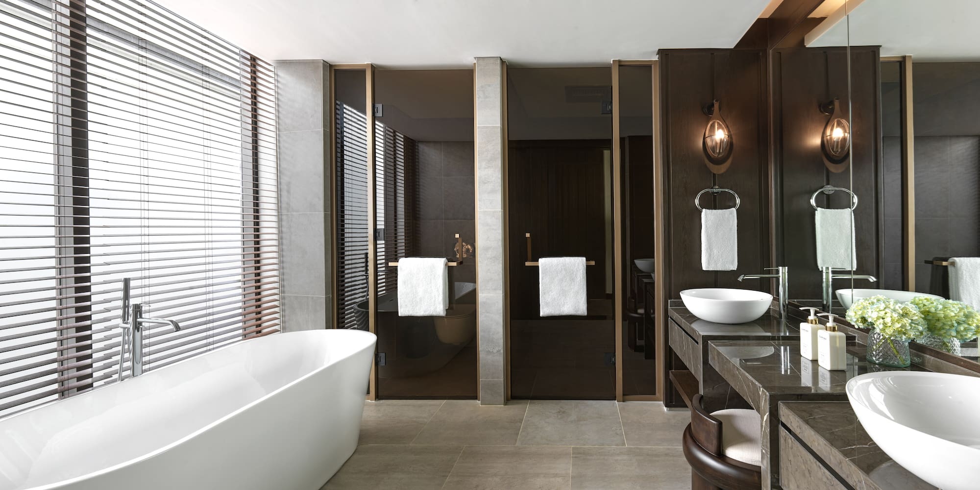 a bathroom with a tub and sink