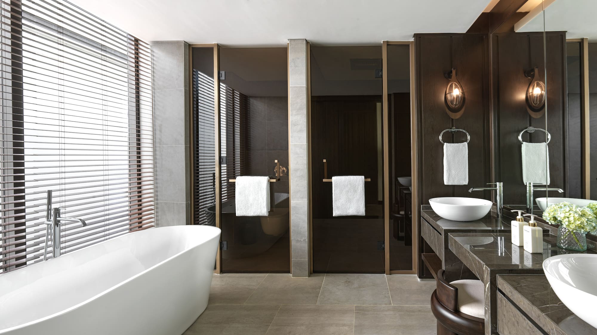 a bathroom with a tub and sink