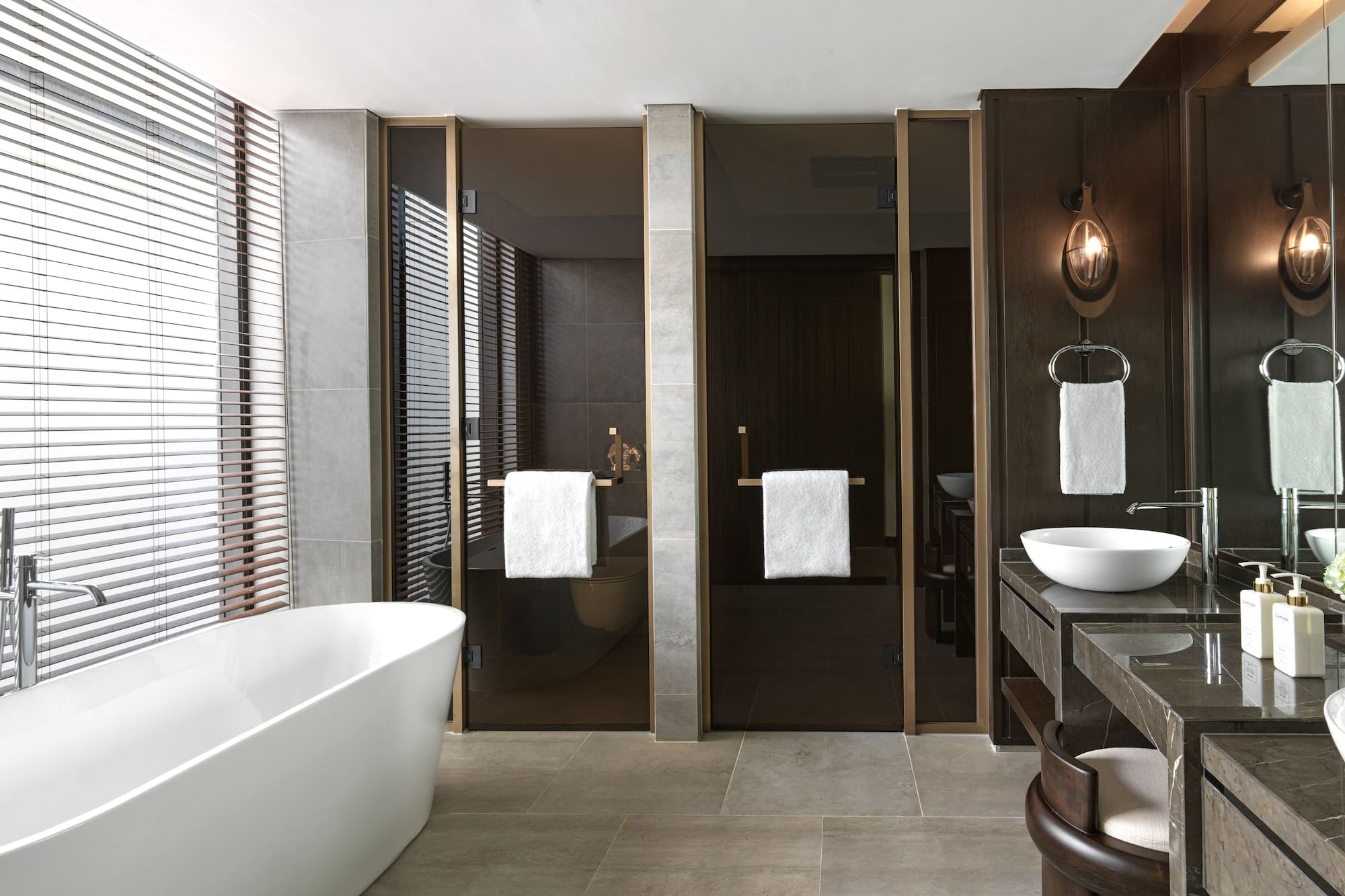 a bathroom with a tub and sink