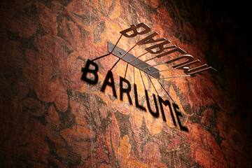a metal sign on a wall