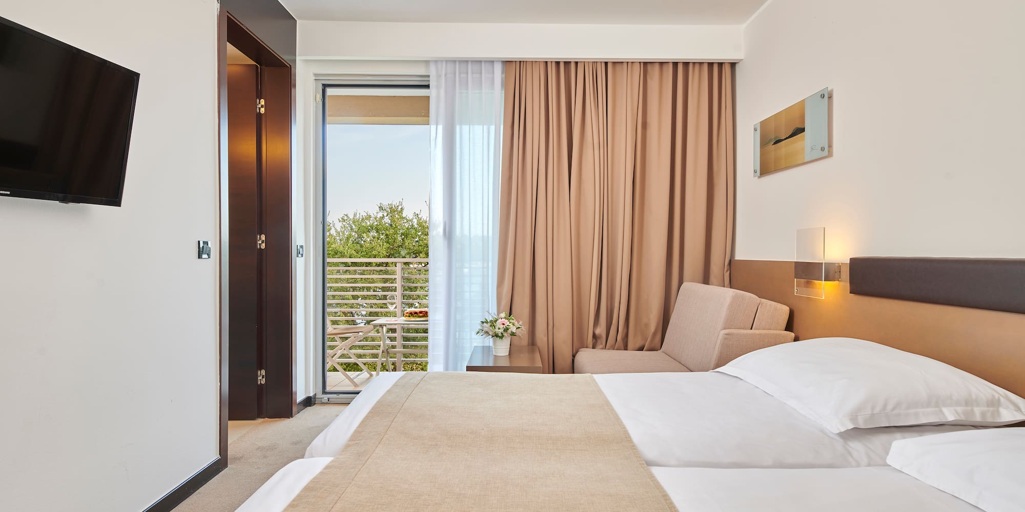 a bedroom with a bed and a door