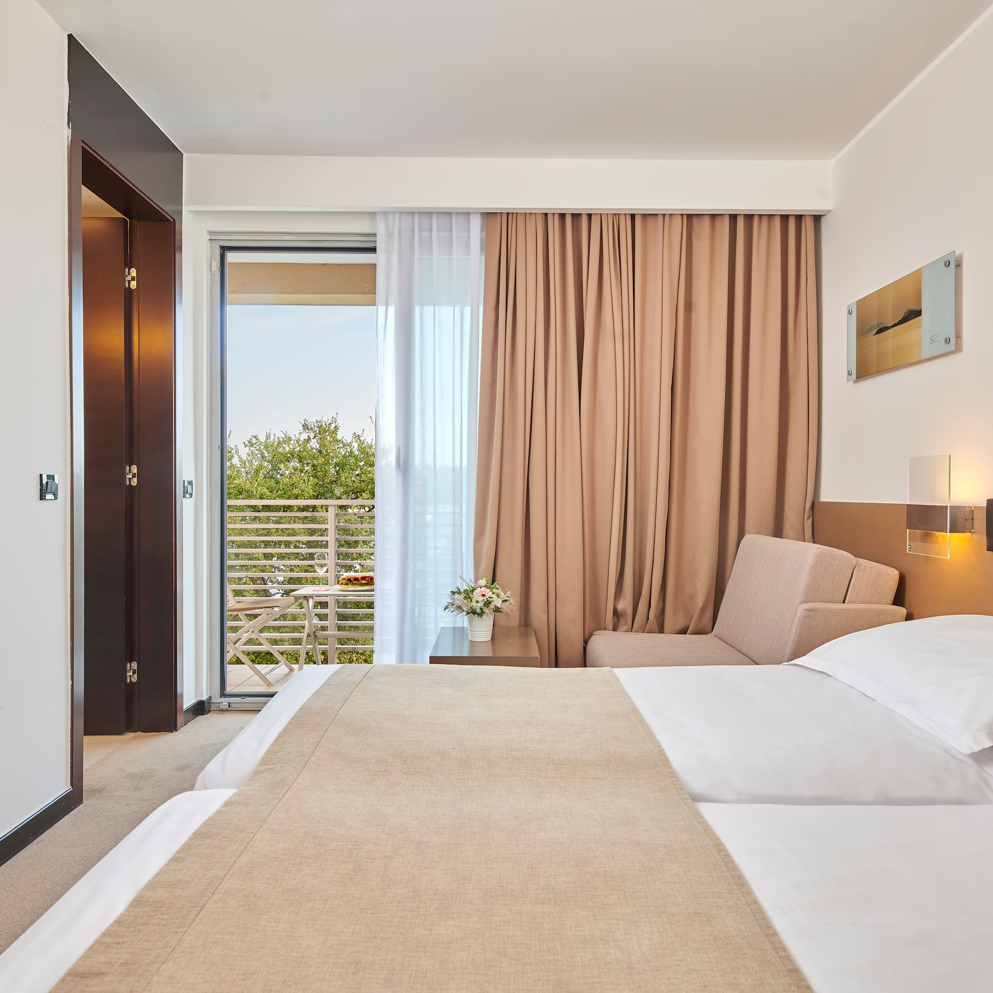 a bedroom with a bed and a door