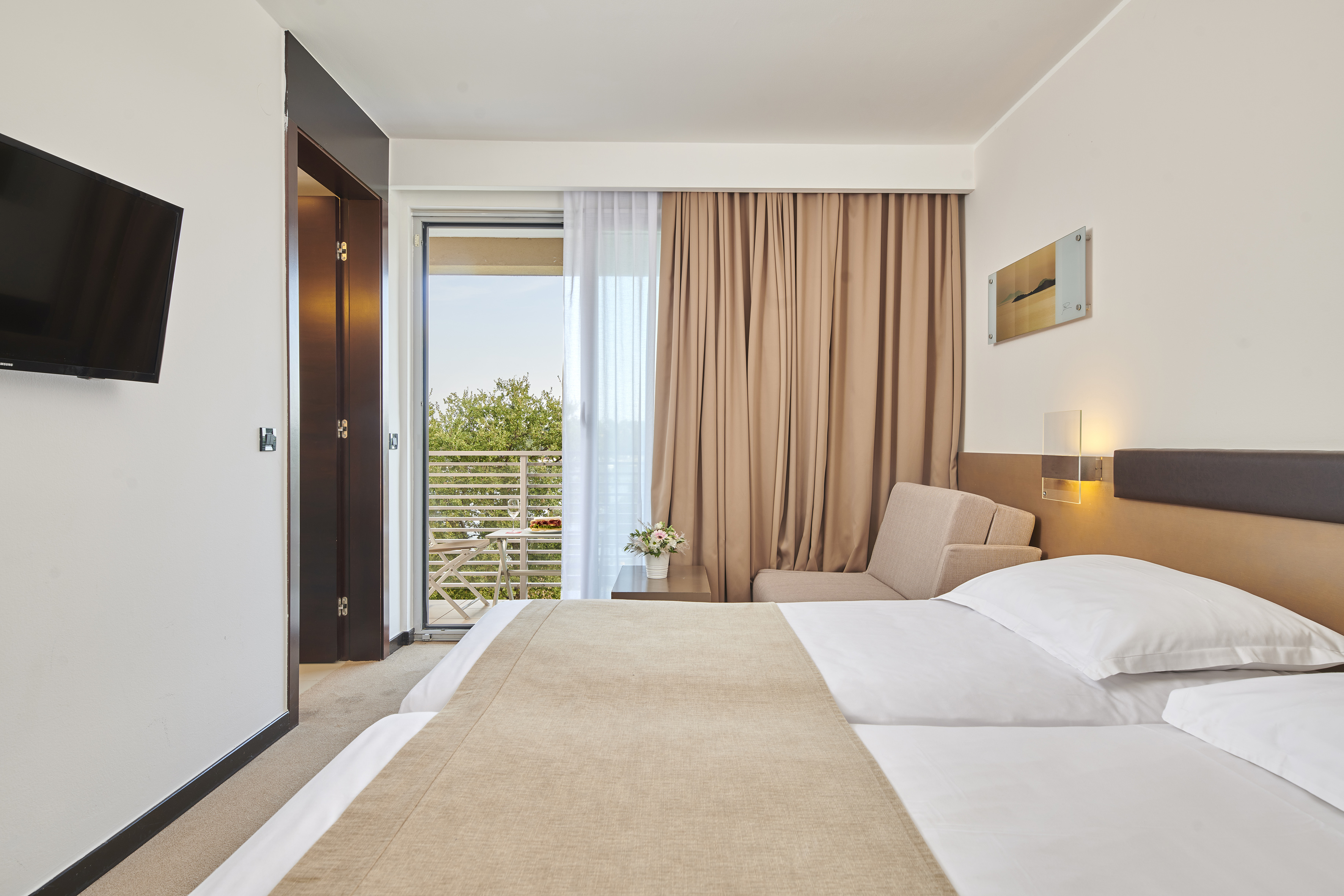 a bedroom with a bed and a door