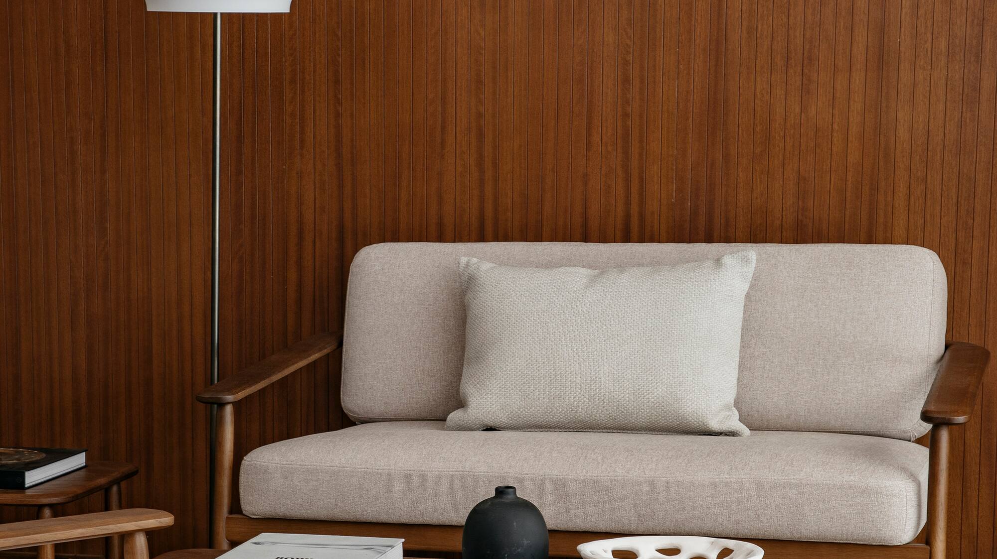 a couch and a lamp in a room