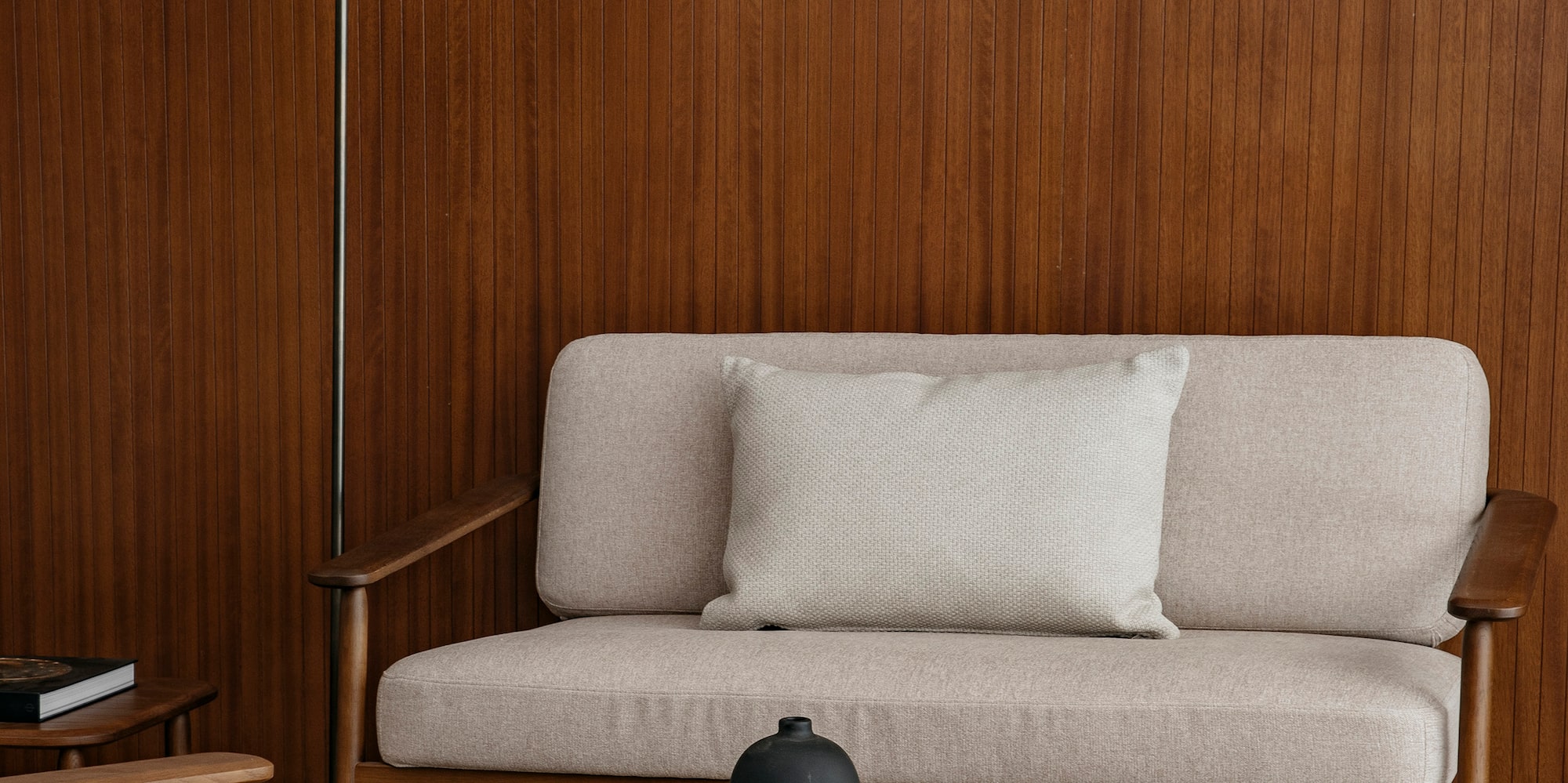 a couch and a lamp in a room