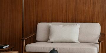 a couch and a lamp in a room