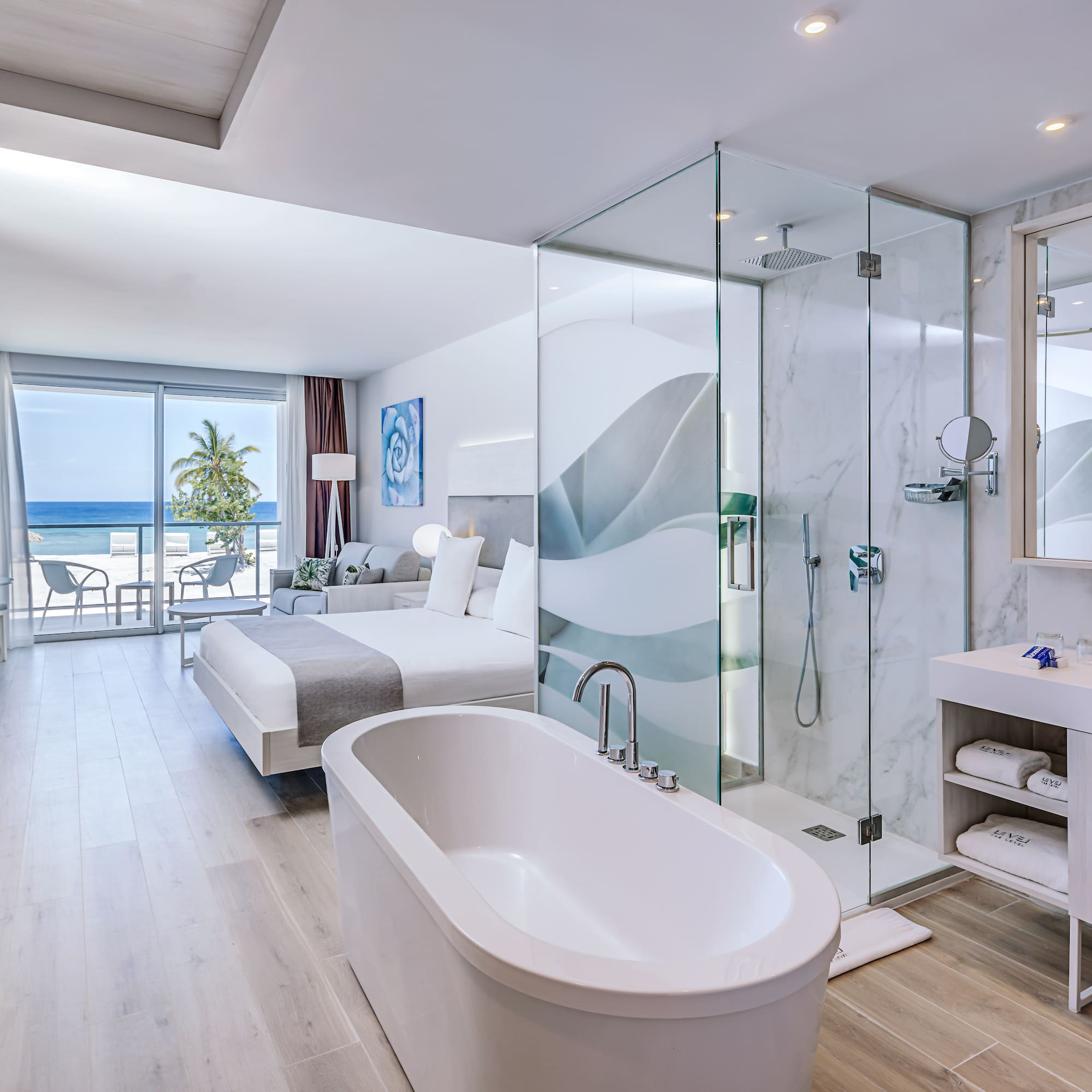 a bathroom with a glass shower and a bathtub