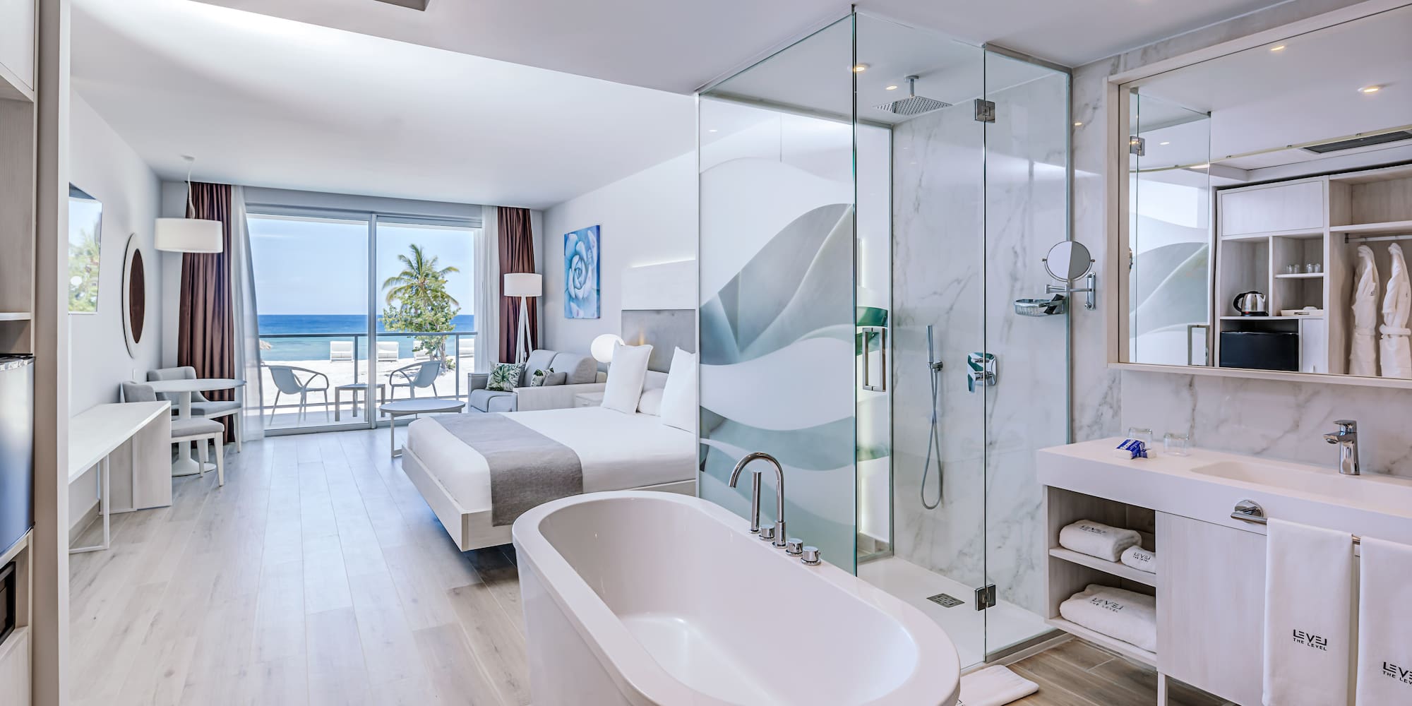 a bathroom with a glass shower and a bathtub