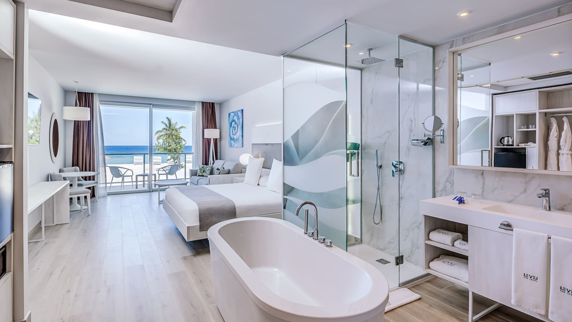 a bathroom with a glass shower and a bathtub