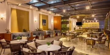 a room with tables and chairs