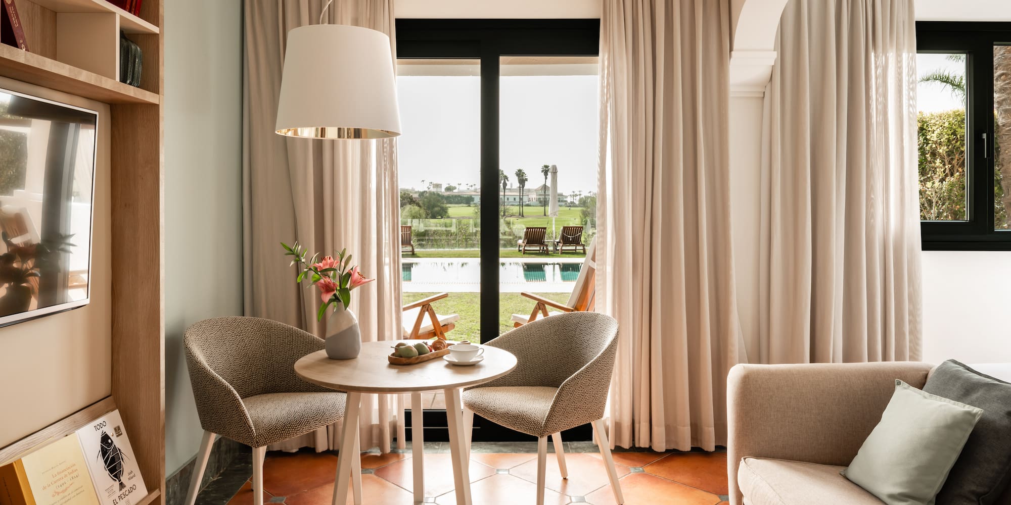 a room with a table and chairs