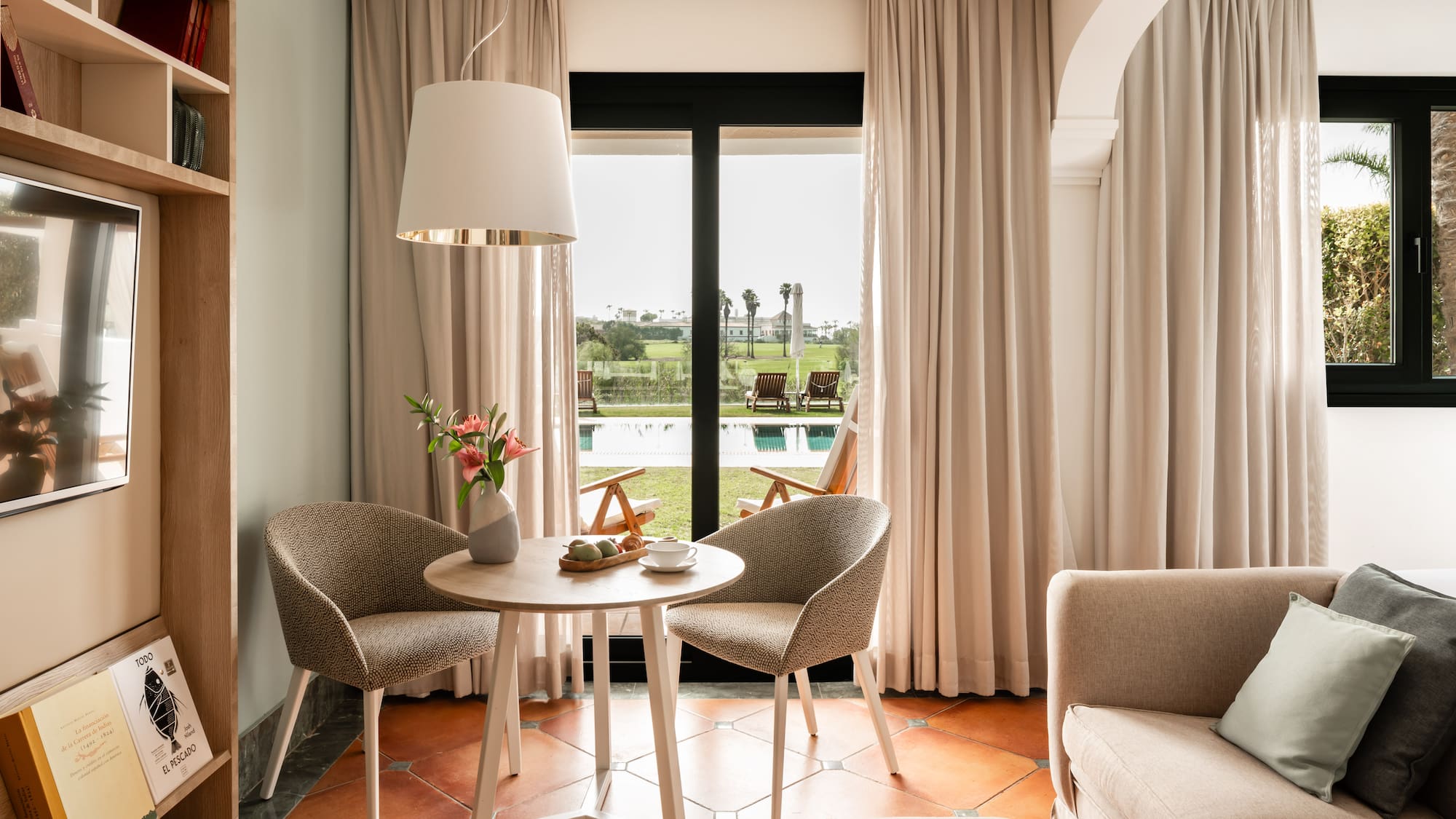 a room with a table and chairs