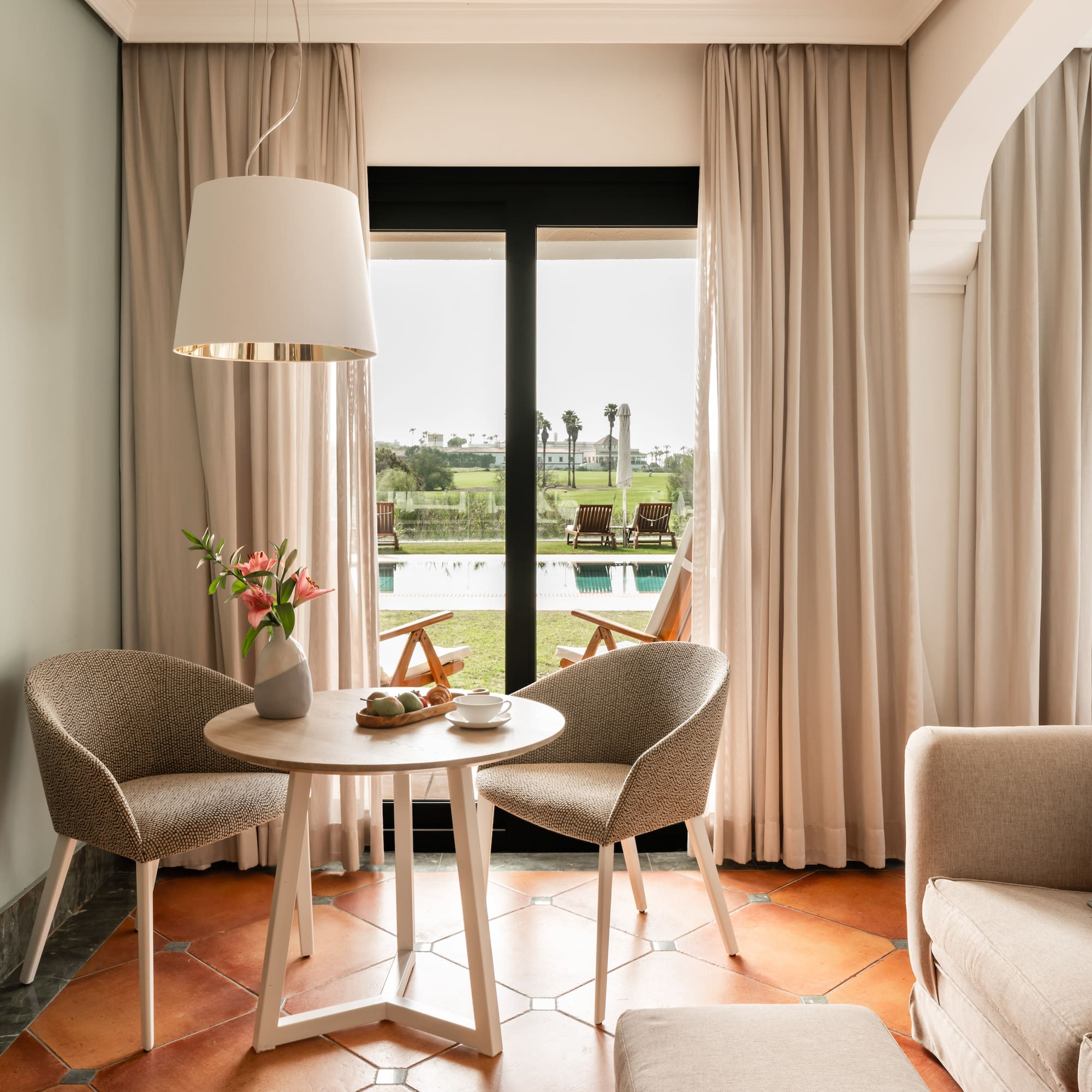 a room with a table and chairs