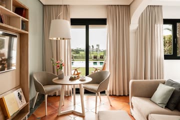 a room with a table and chairs