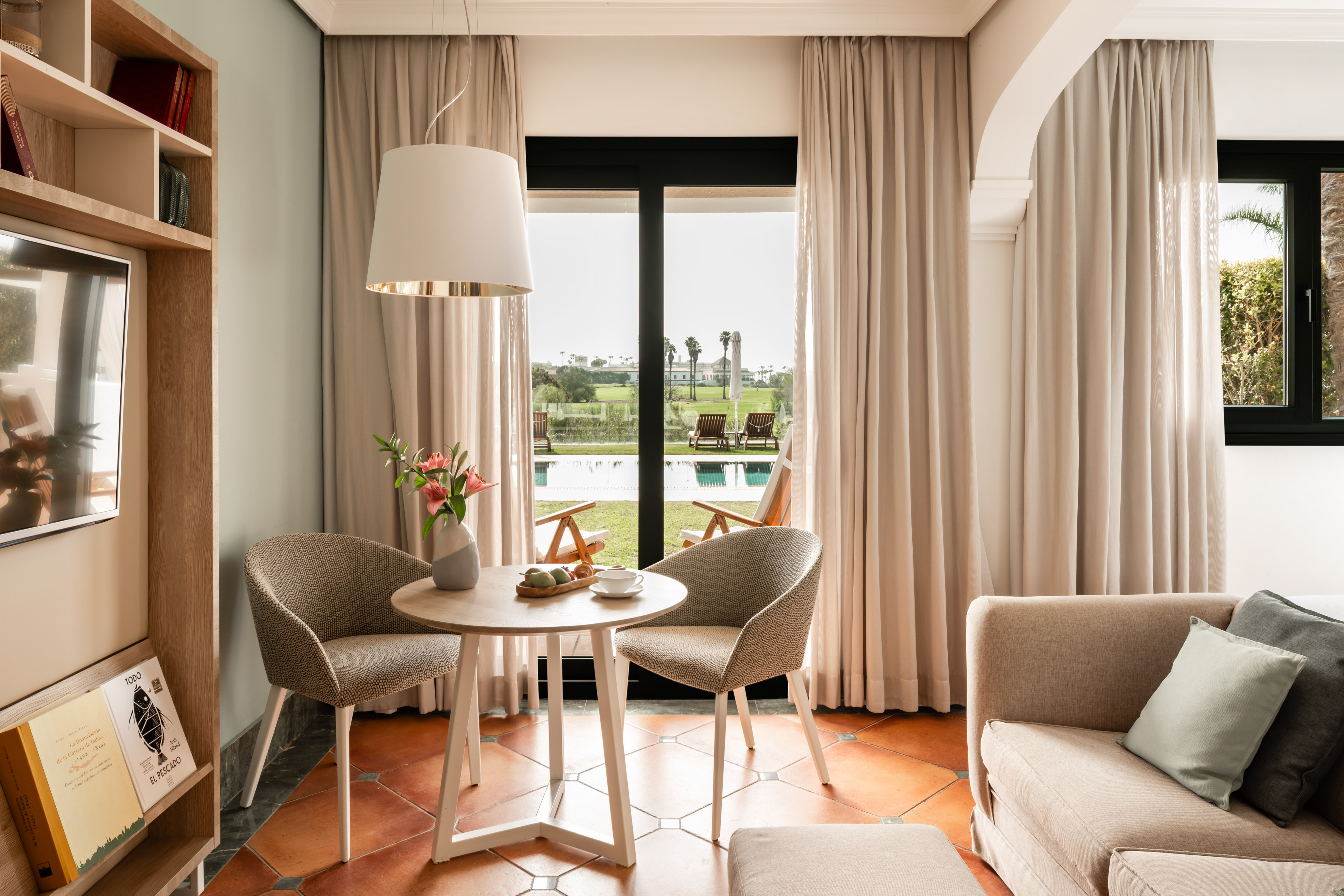 a room with a table and chairs