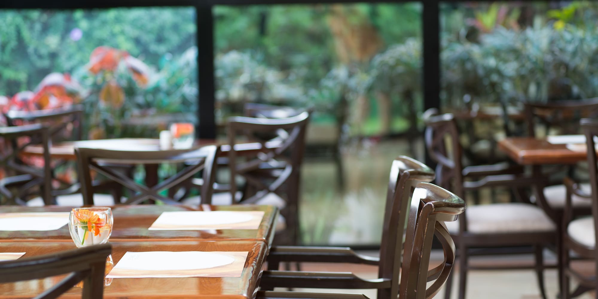 a restaurant with tables and chairs
