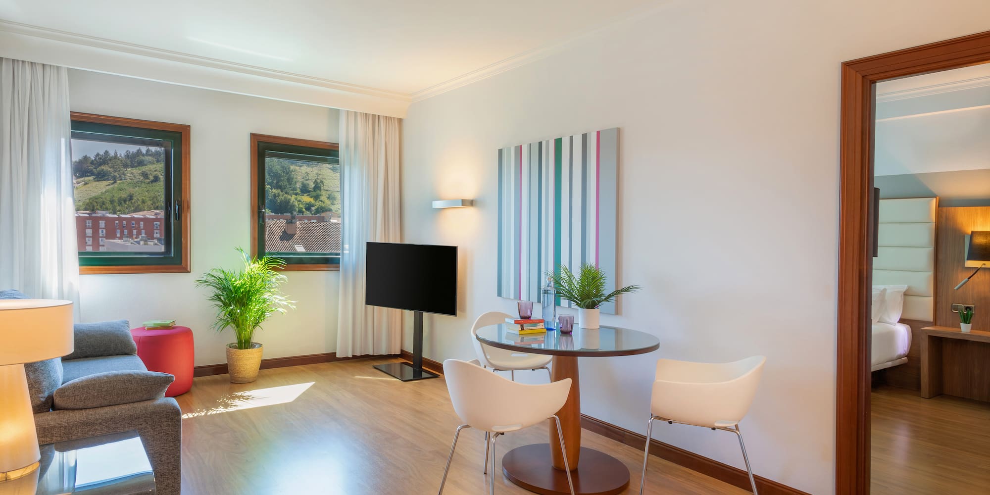 a room with a table and chairs