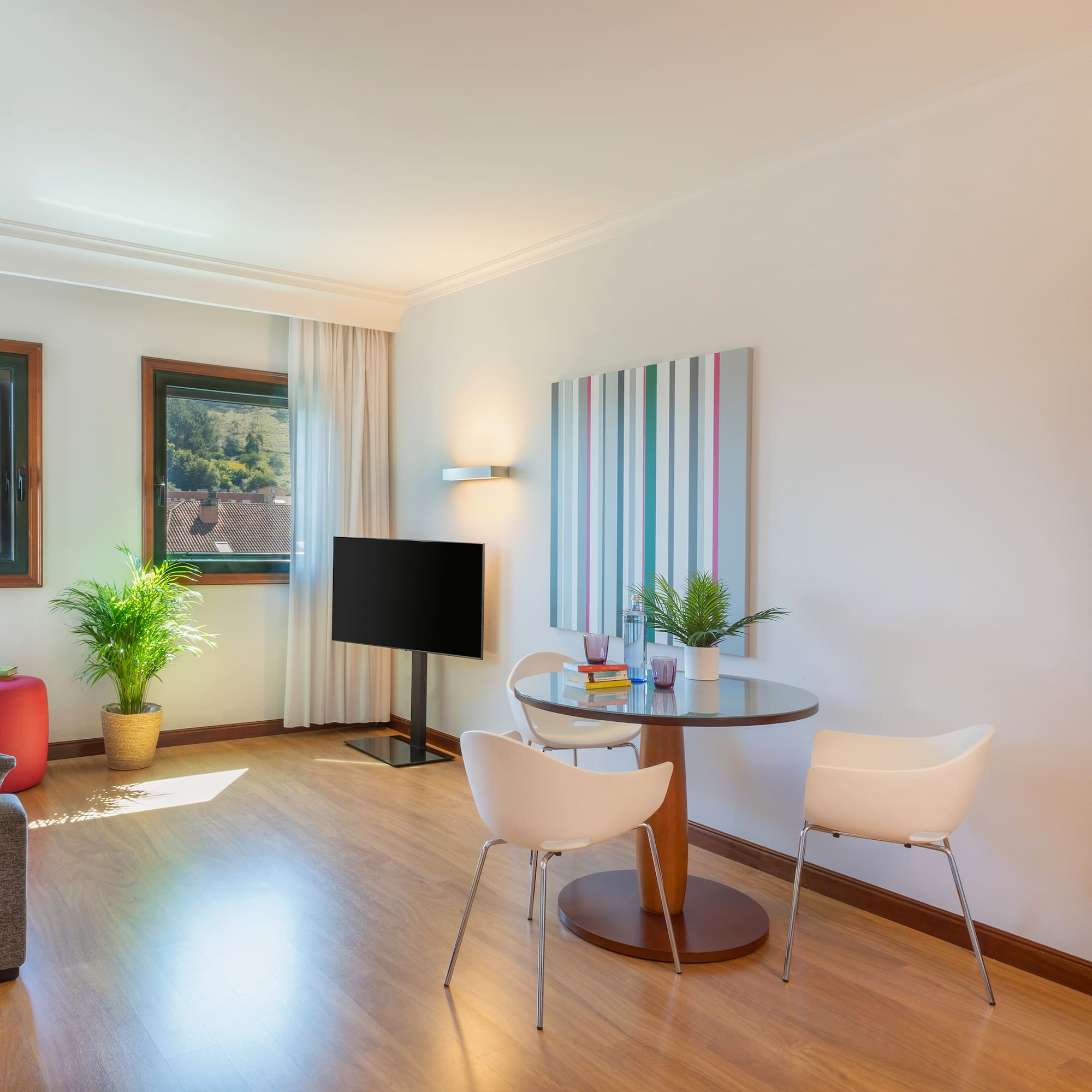 a room with a table and chairs