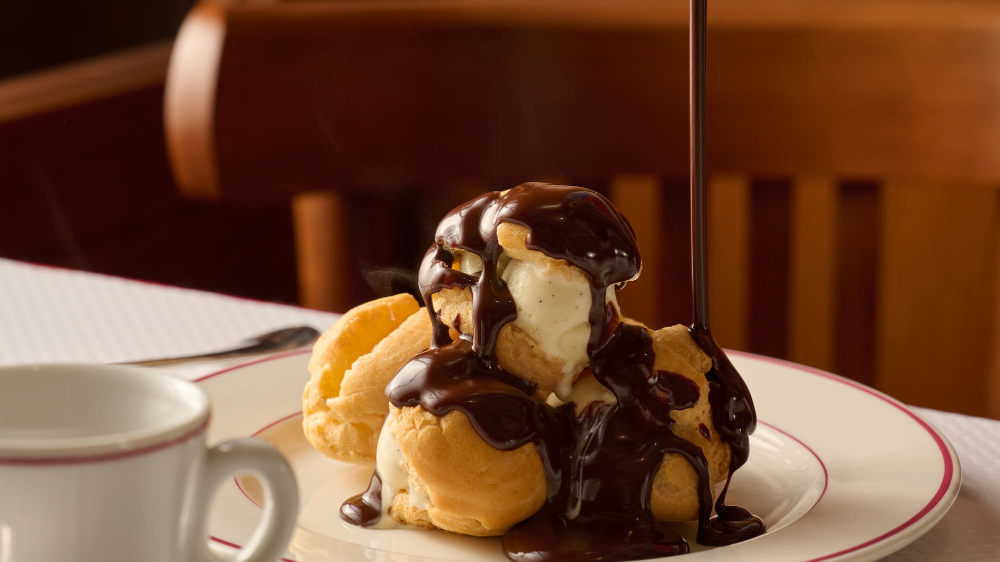 a plate of dessert with chocolate sauce