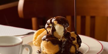 a plate of dessert with chocolate sauce