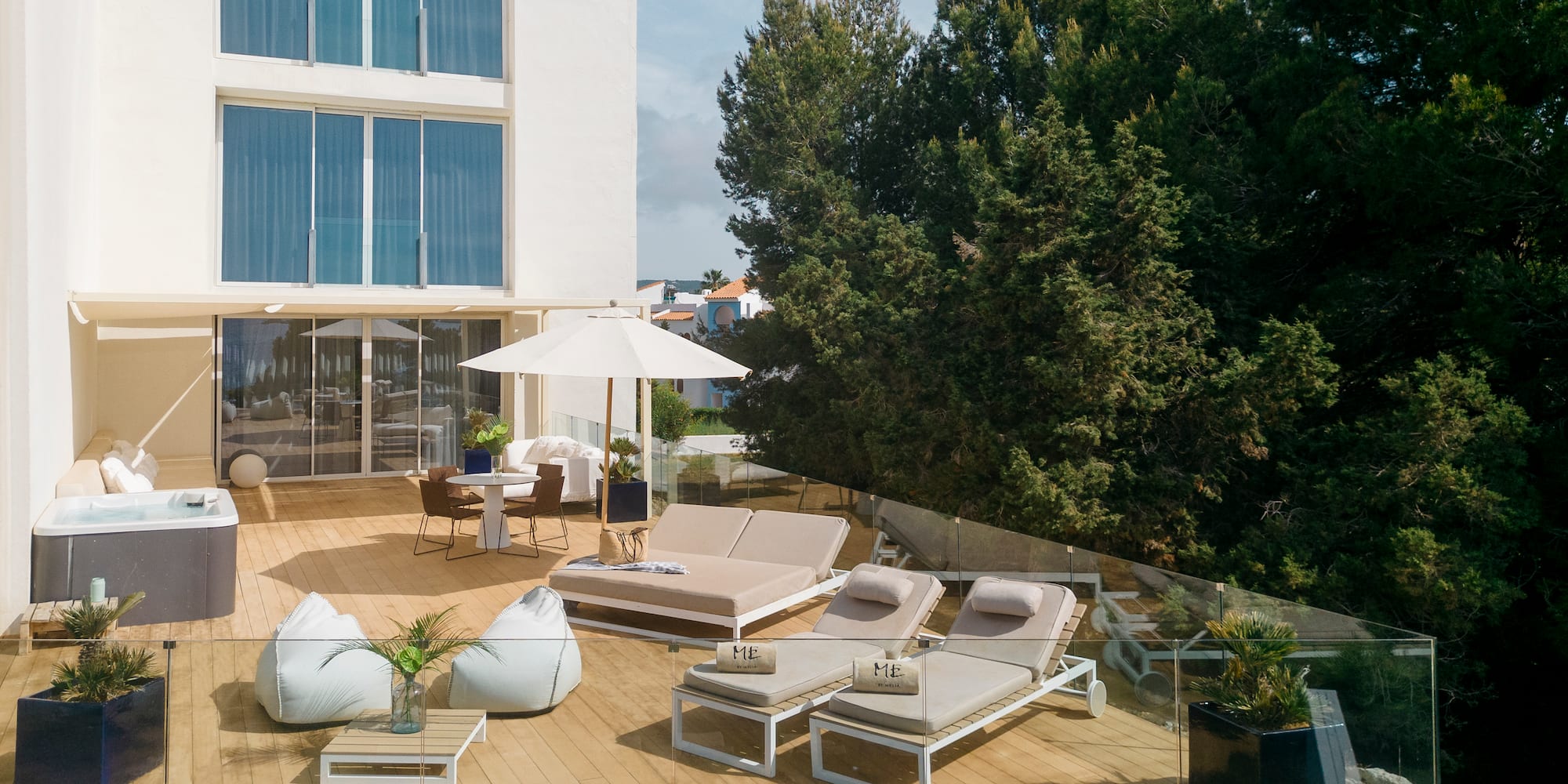 a deck with chairs and umbrellas on it