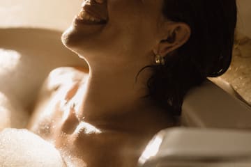 a woman in a bathtub