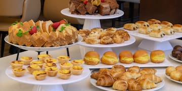 a group of plates of pastries