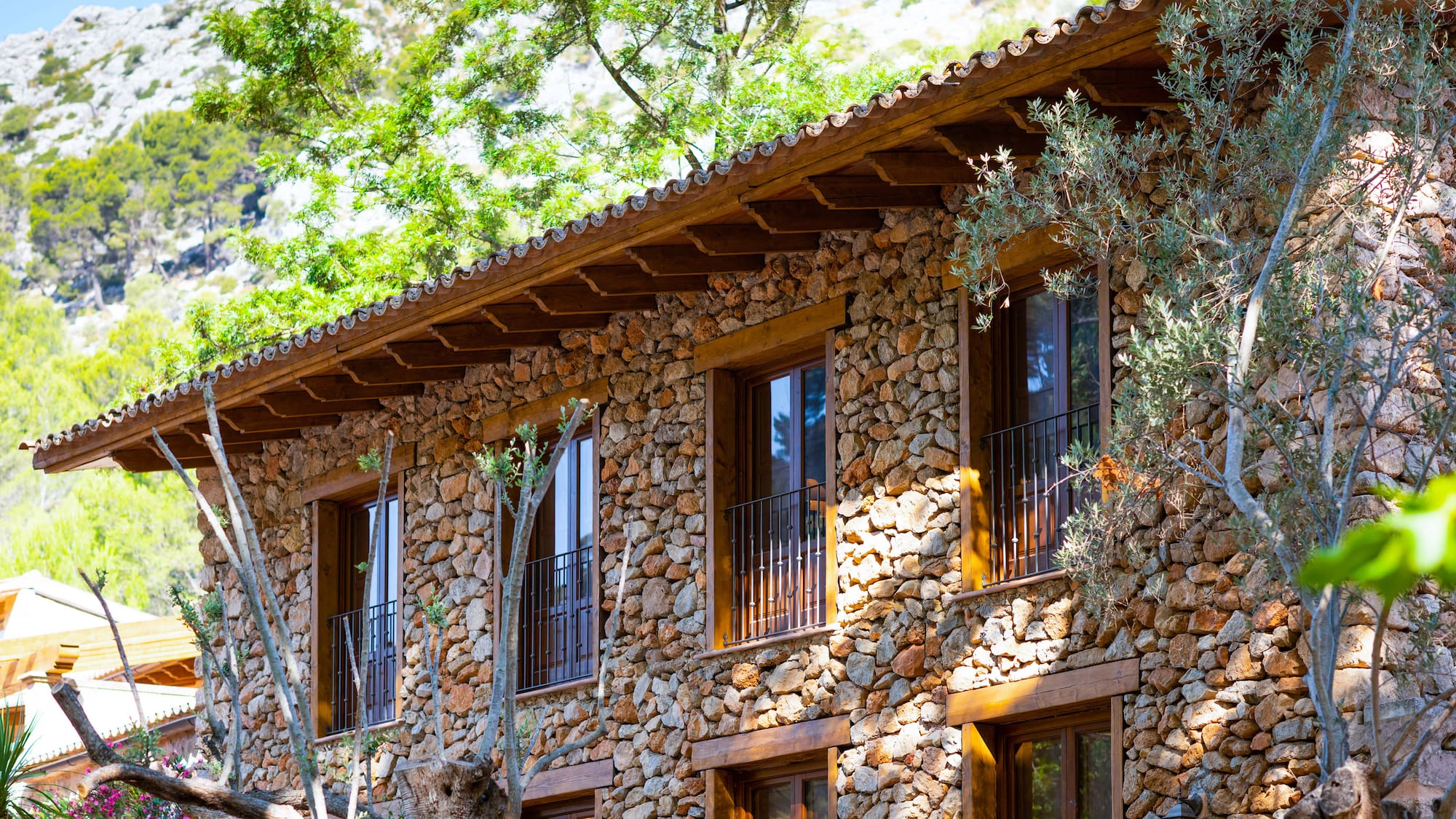a building with trees on the side
