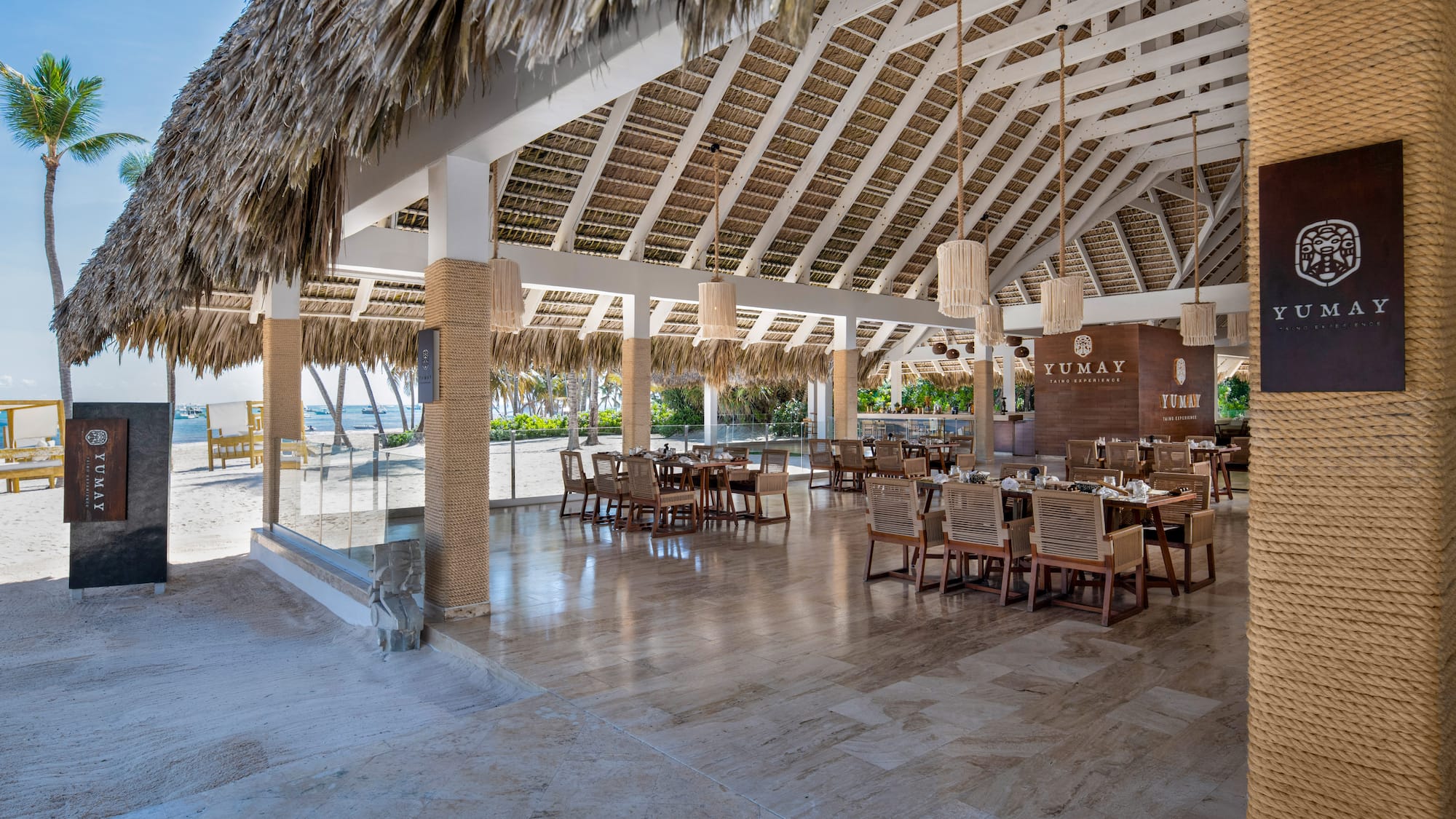 a restaurant with tables and chairs