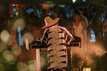 a person playing music at a party
