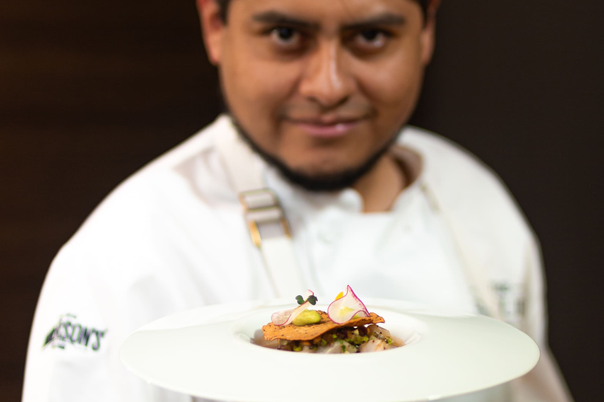a man holding a plate of food