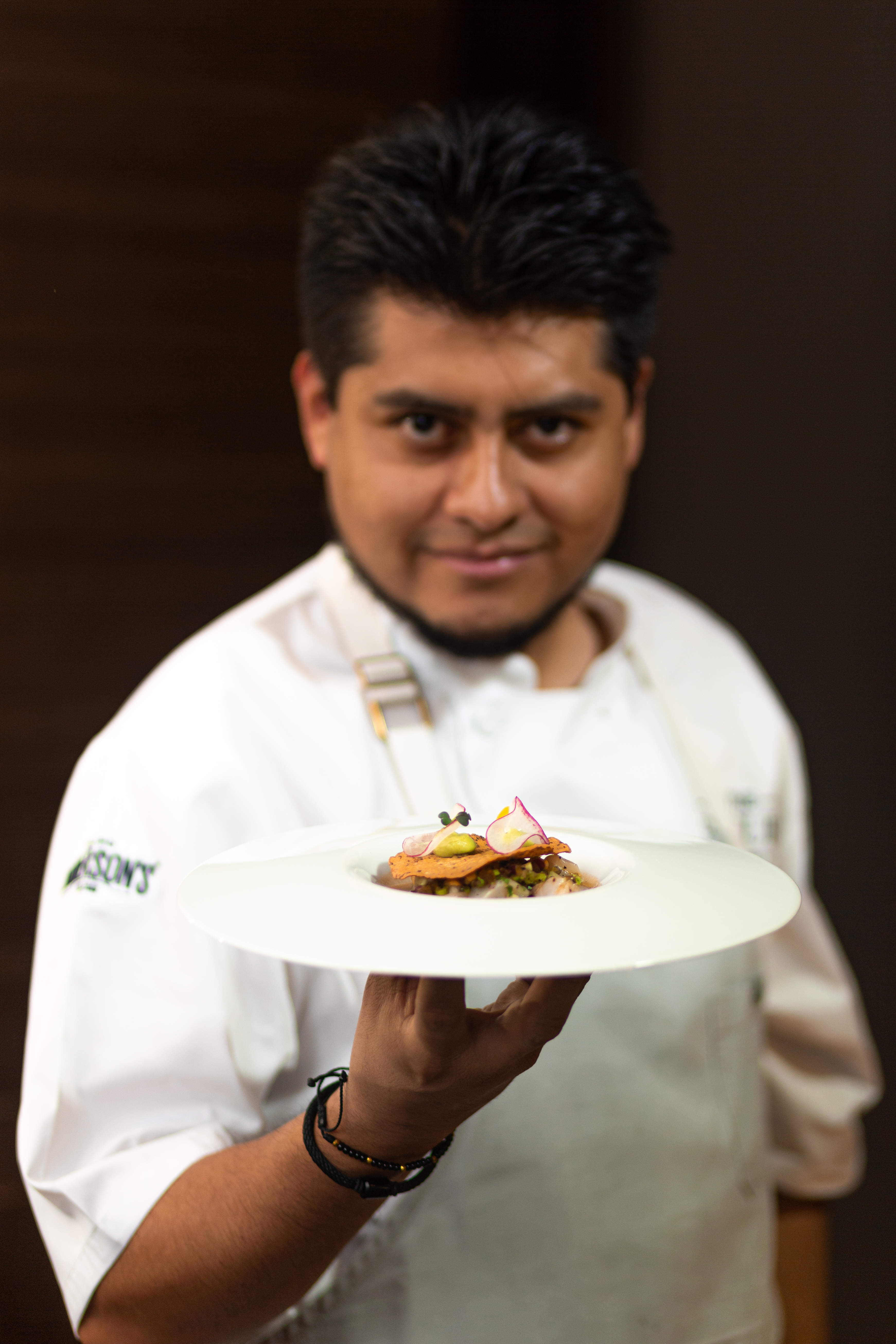 a man holding a plate of food