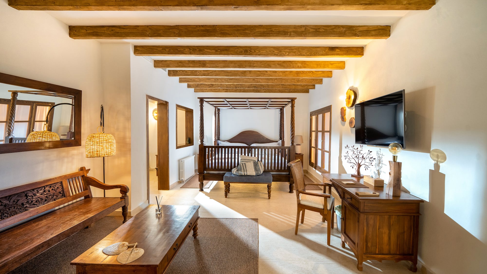 a room with a television and a couch