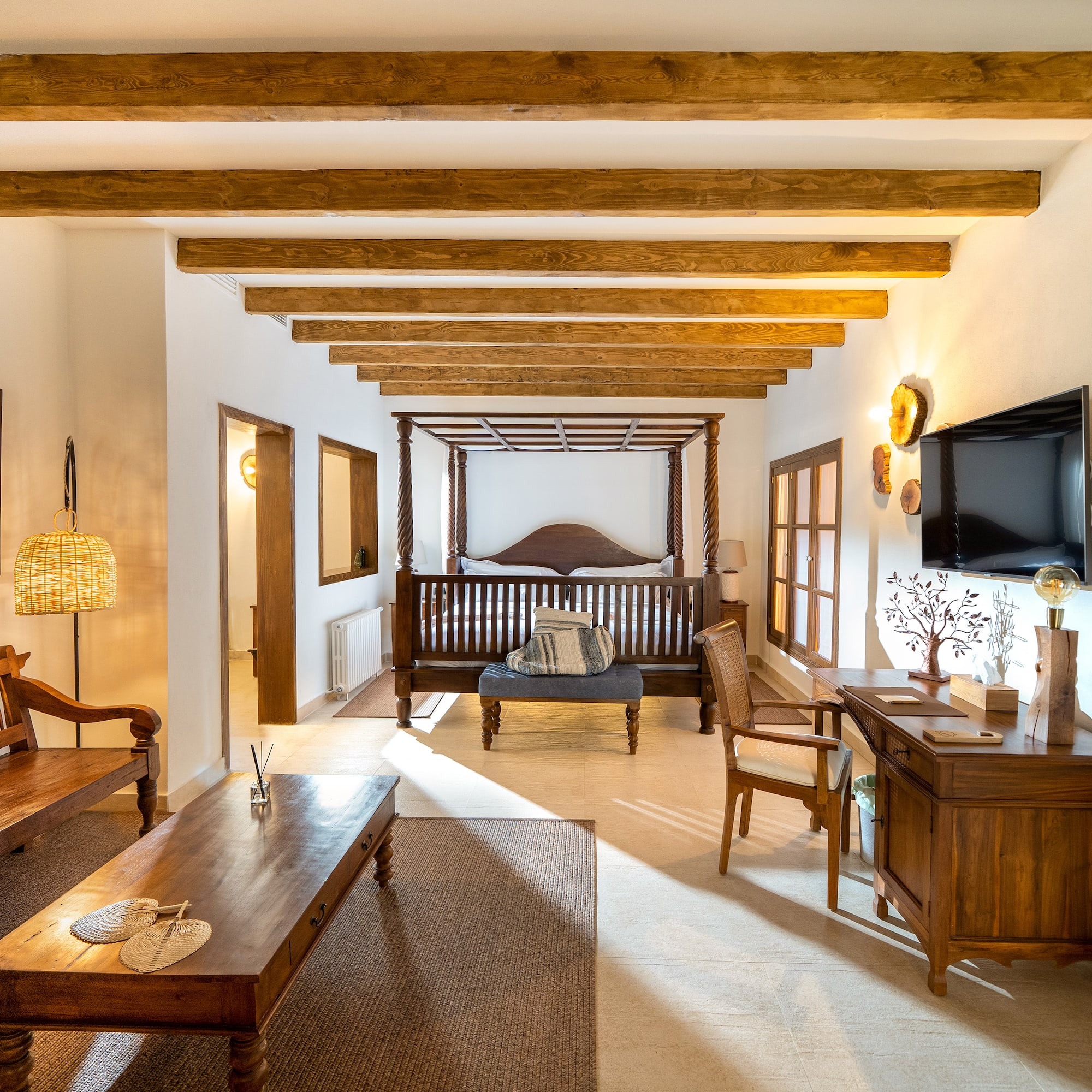 a room with a television and a couch