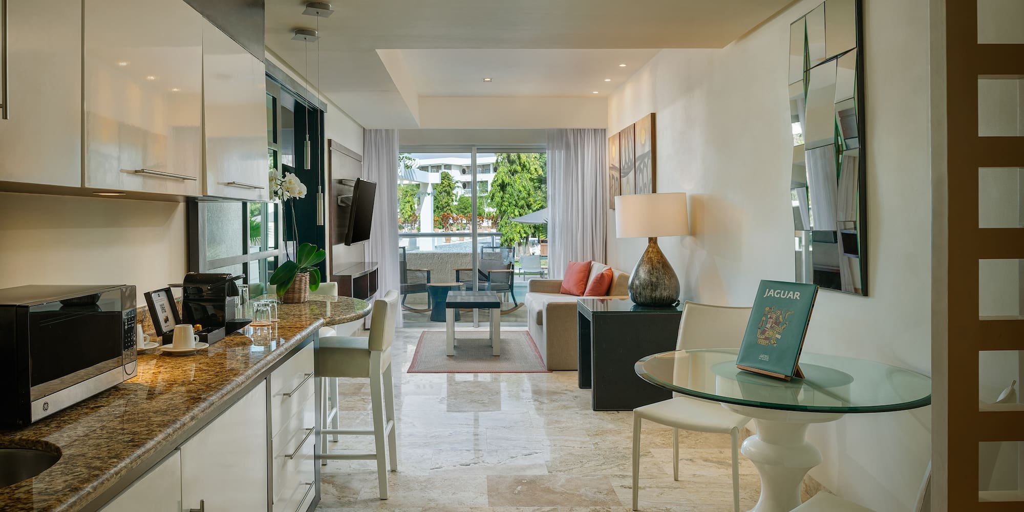 a kitchen and dining area in a hotel